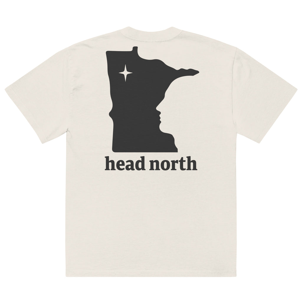 Back view of beige oversized T-shirt with black Minnesota logo and 'head north' text