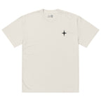 Beige colored oversized T-shirt with black north star logo on chest, casual oversized style