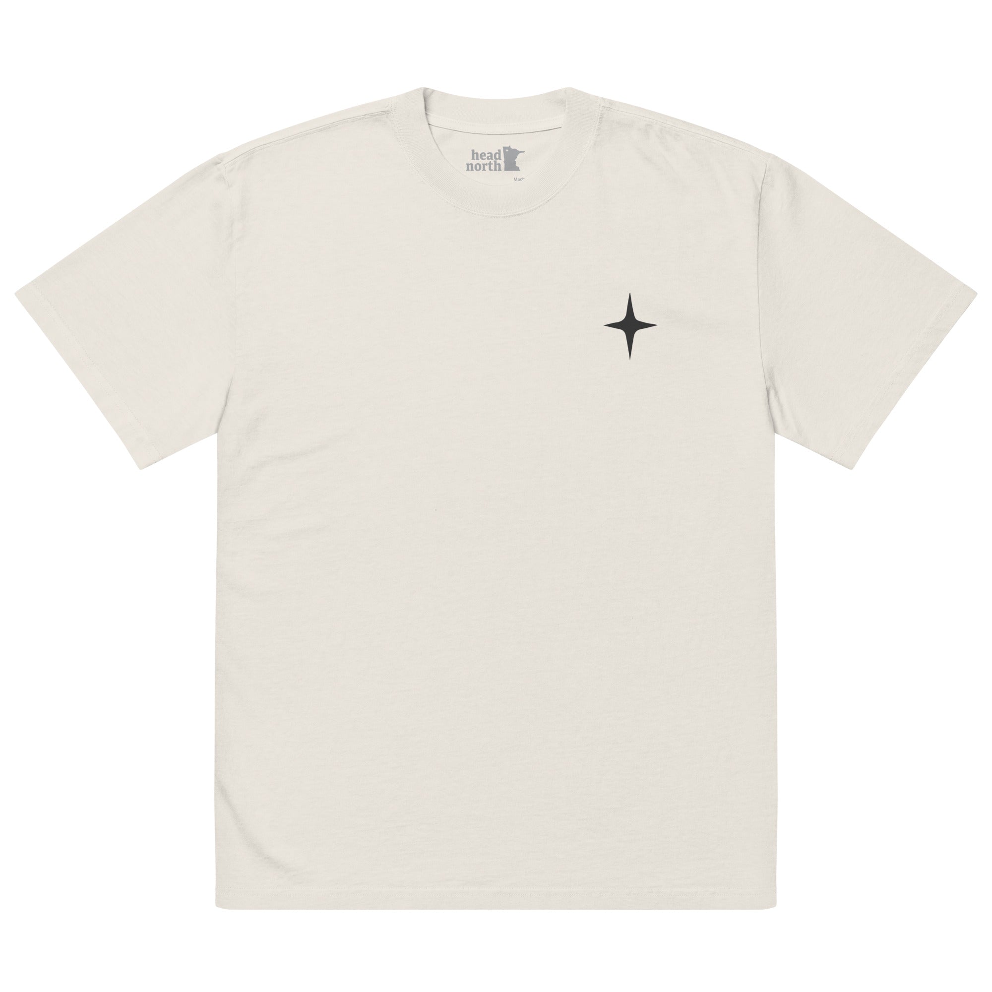 Beige colored oversized T-shirt with black north star logo on chest, casual oversized style