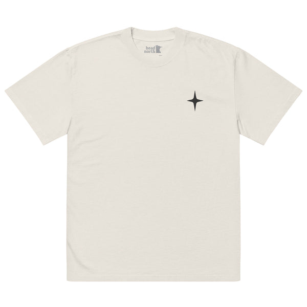 Beige colored oversized T-shirt with black north star logo on chest, casual oversized style