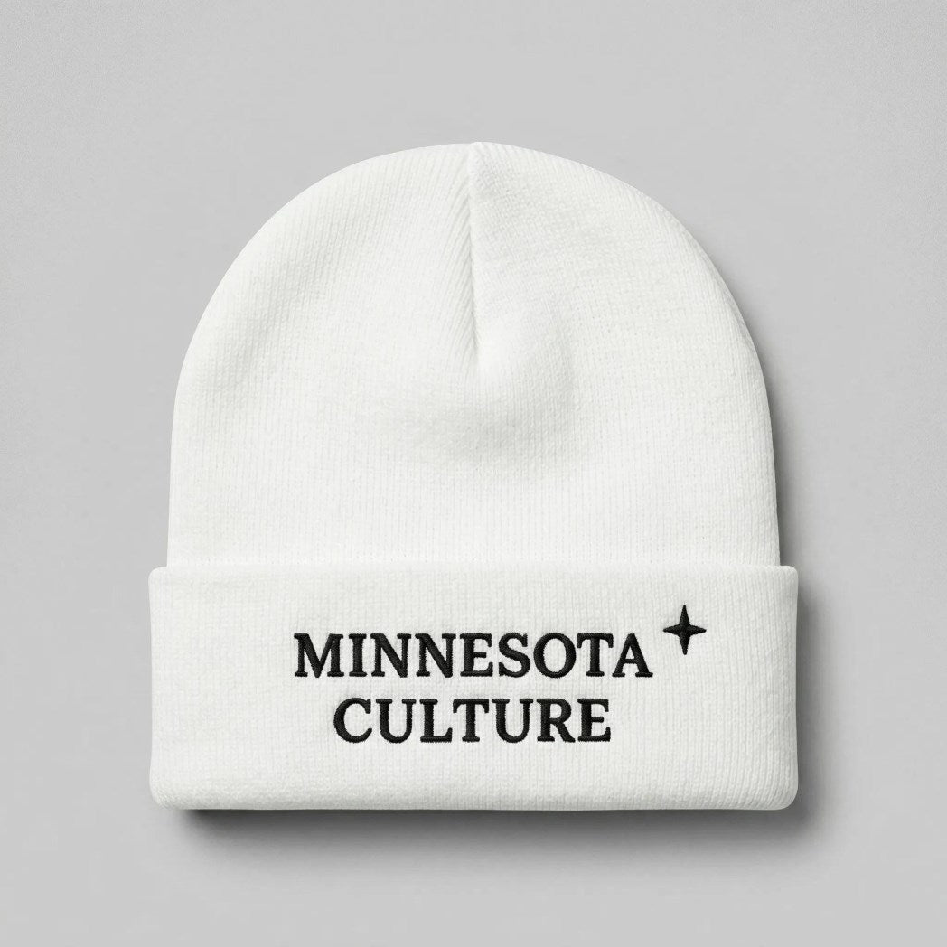 White cuffed beanie with "MINNESOTA CULTURE" embroidered in black text, and a small black north star accent