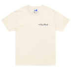Front of beige T-shirt with black and blue Head North Clothing Supply logo